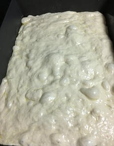 Dough resting in pan for Detroit pizza